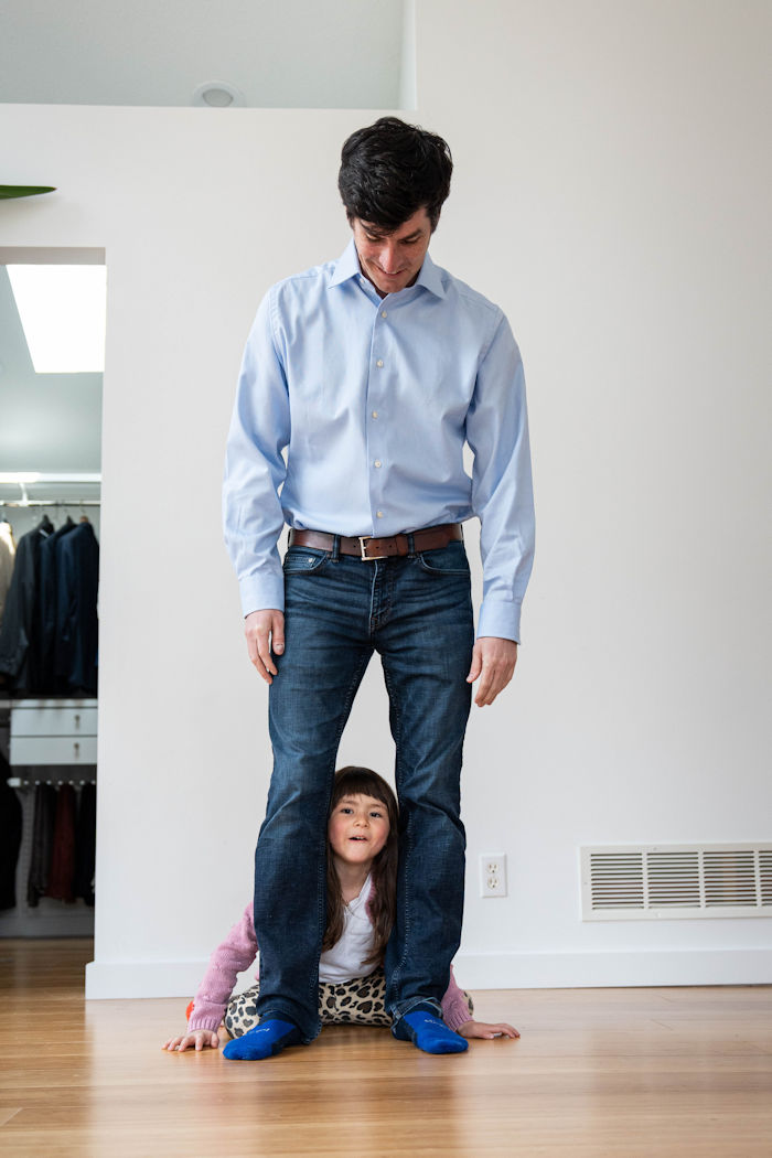 Matt with his daughter down by his legs